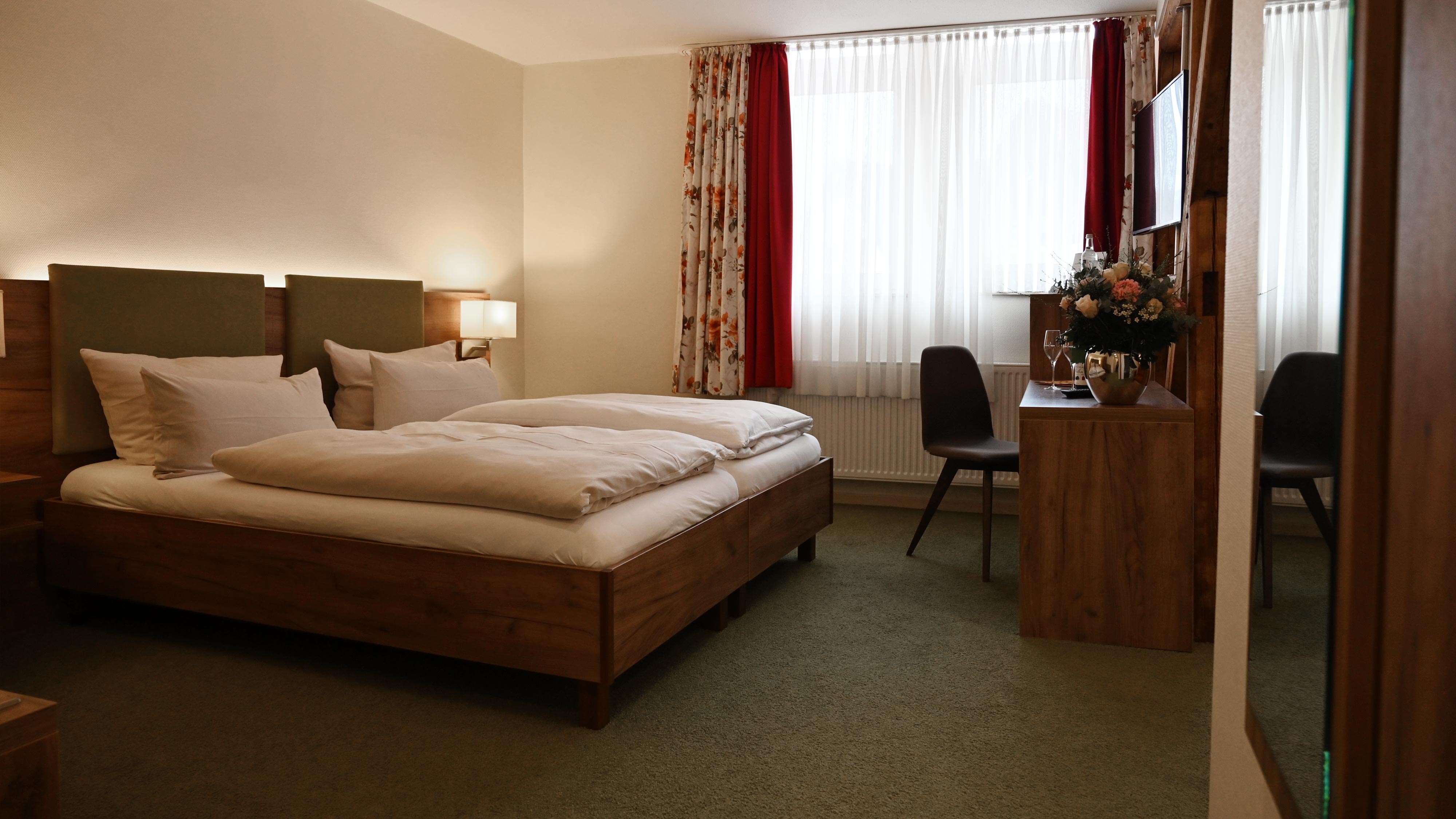 Modernes Appartement im Hotel Schmidt am Markt in Meppen mit Wohnbereich  Bildbeschreibung: Geräumiges Appartement mit Wohnbereich im Hotel Schmidt am Markt – ideal für längere Aufenthalte in Meppen.